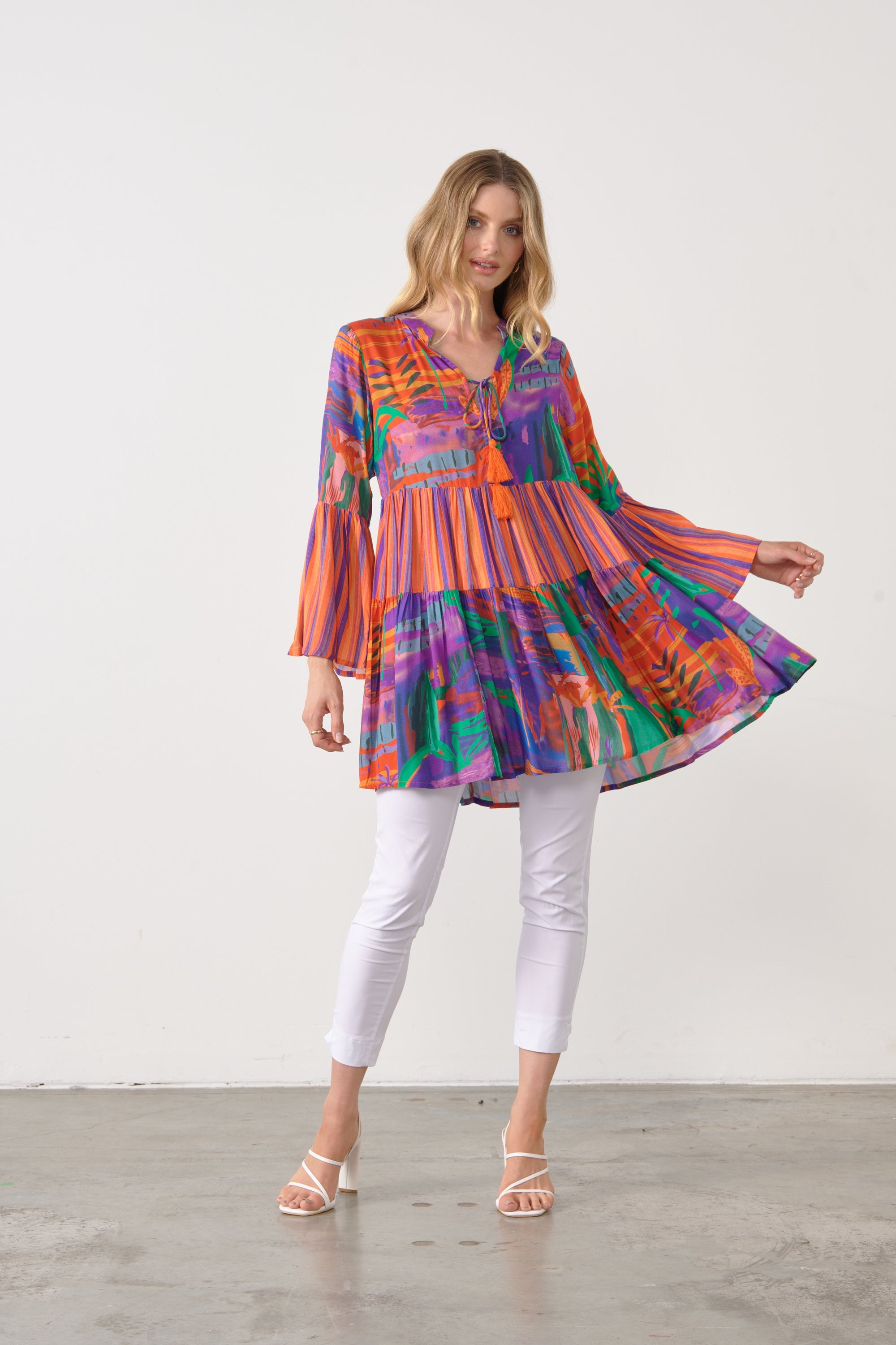 CARNIVAL PRINT TUNIC TASSLE TIE TOP