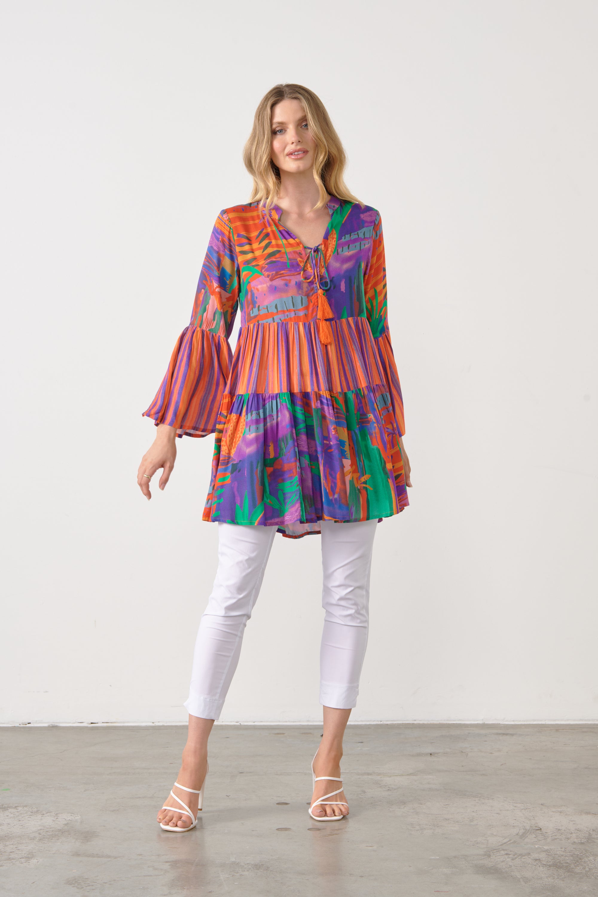 CARNIVAL PRINT TUNIC TASSLE TIE TOP